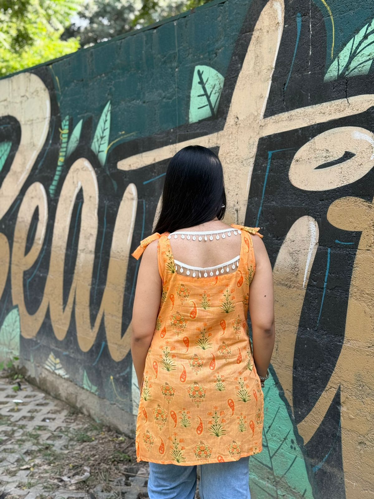 Orange Floral Printed Cotton Kurti with Tie-Up Shoulder Straps